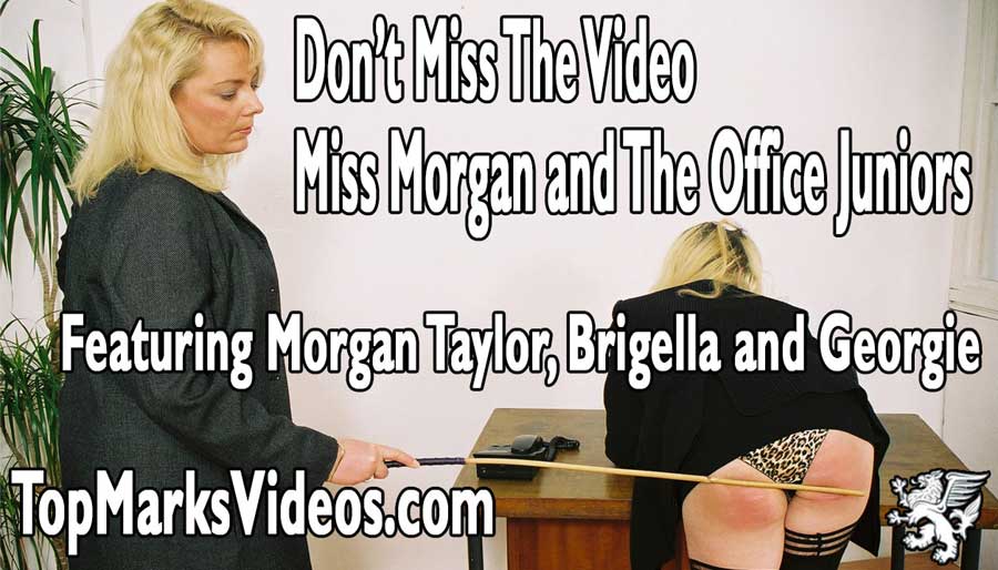 Morgan Taylor spanks and canes her office juniors Brigella and Georgina in the video Miss Morgan and the Office Juniors